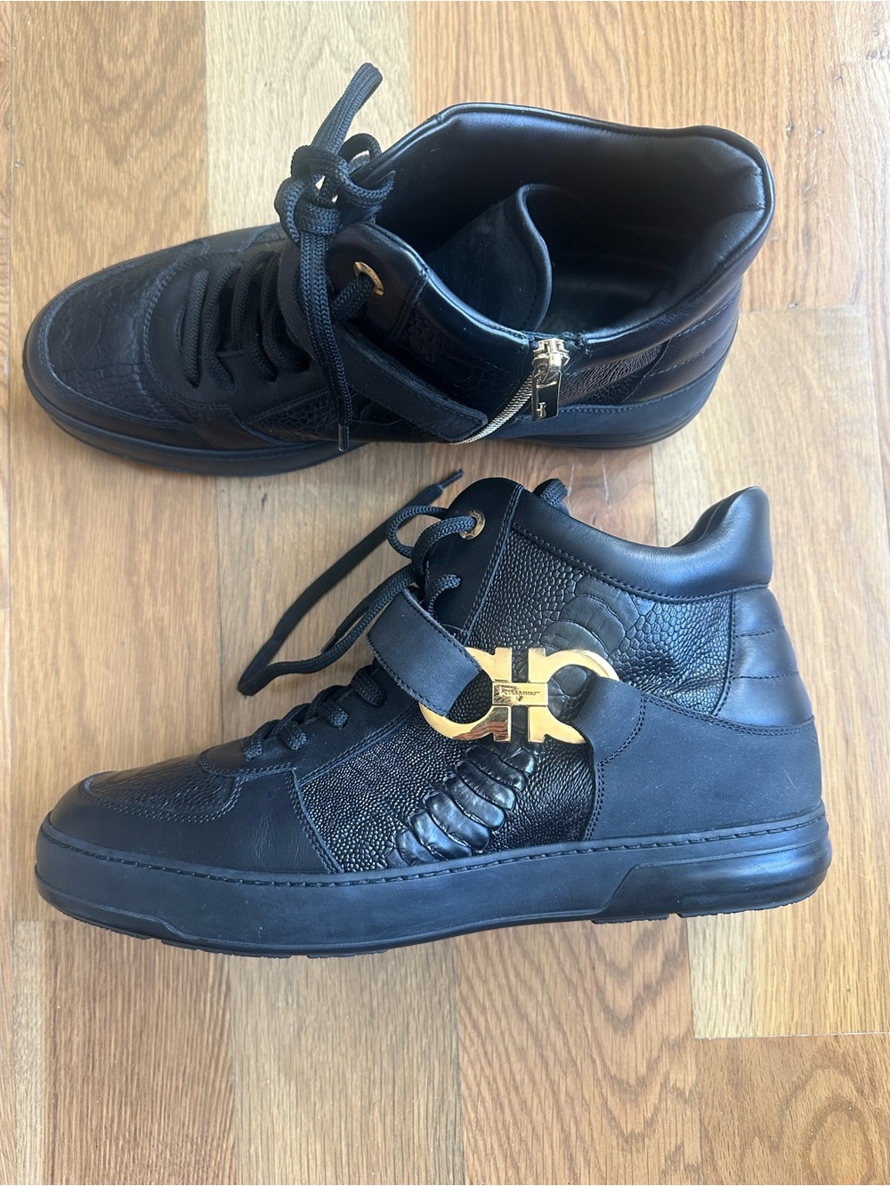 Salvatore Ferragamo Black Leather High-Top Sneakers with Gold Gancini Accent